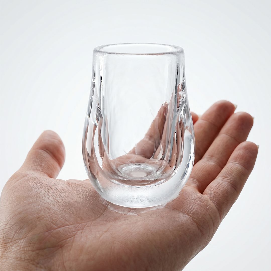 Craft ice shot glass in hand